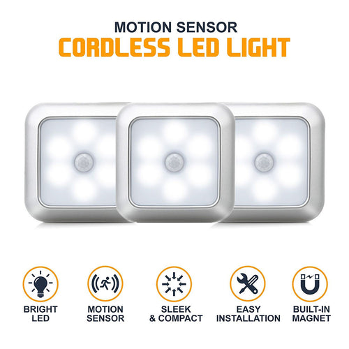 Three puck lights side by side, showing the six LED layout and sensor