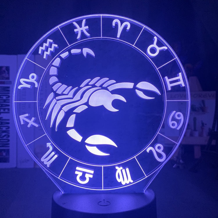 Scorpio scorpion engraved on the acrylic zodiac night light, lit blue