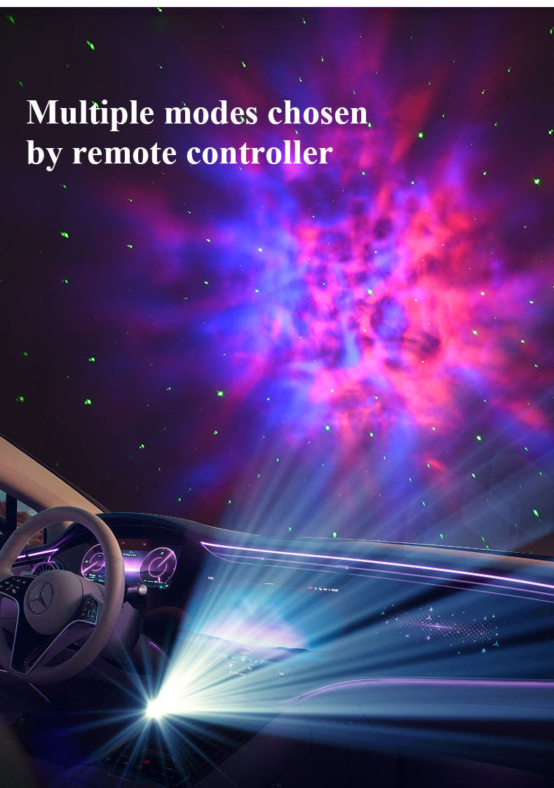 The projector filling a car ceiling with a pink and violet nebula