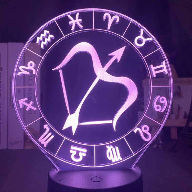 Sagittarius bow and arrow engraved on the acrylic zodiac night light, lit pink