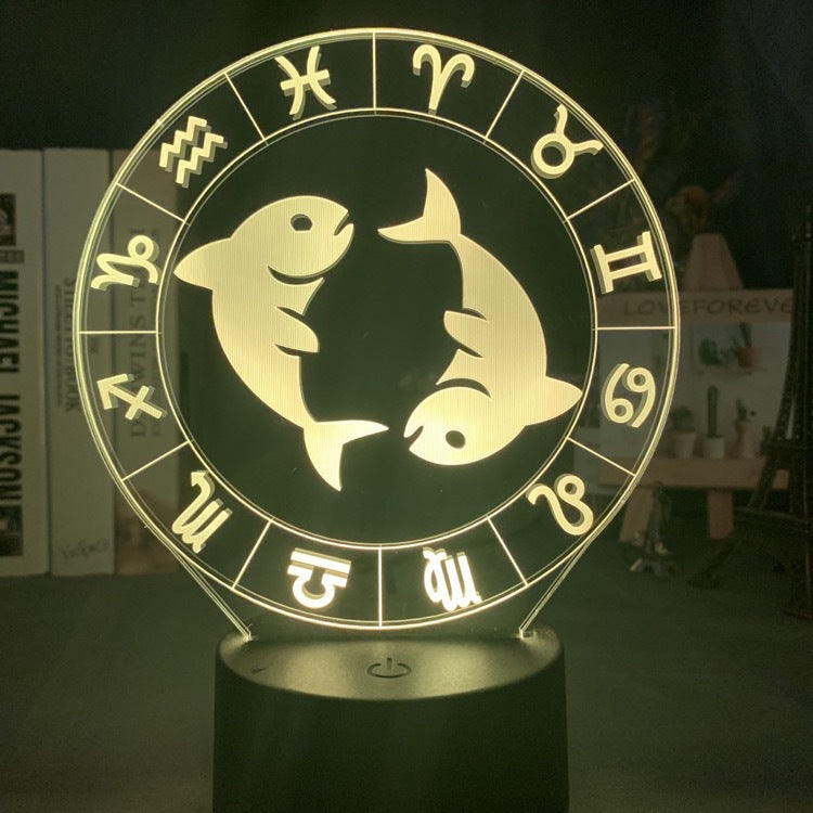 Pisces fish engraved on the acrylic zodiac night light, lit warm white