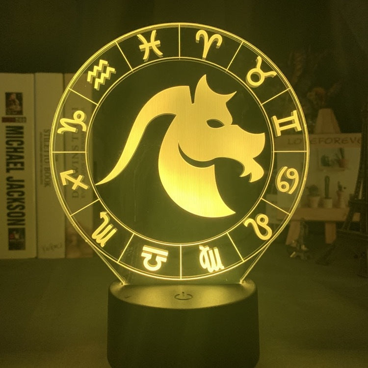Capricorn goat engraved on the acrylic zodiac night light, lit warm amber