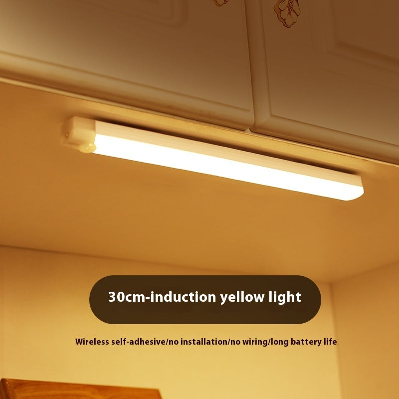 30 cm light bar lighting the counter under a kitchen cabinet