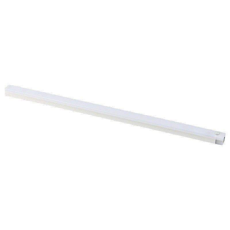 The slim white light bar on a plain background, motion sensor at one end