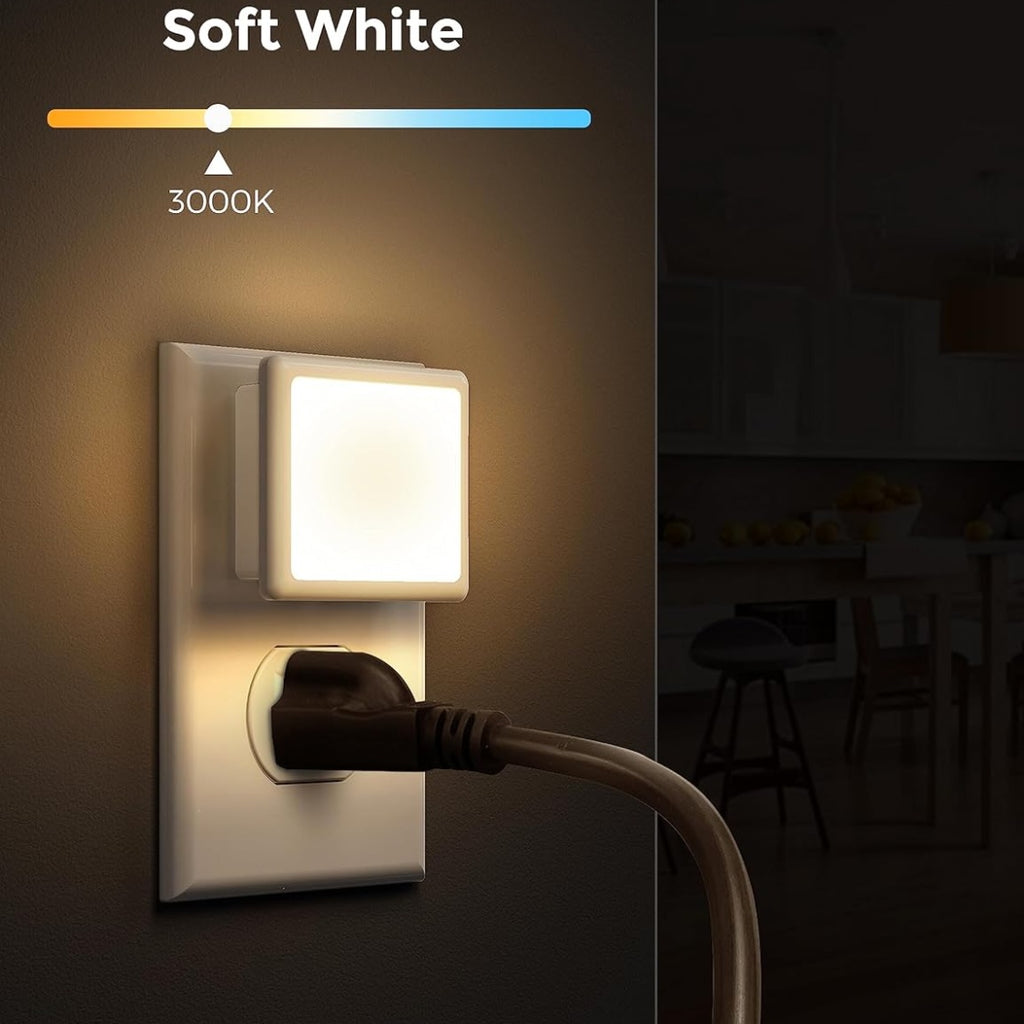 The light at 3000K soft white, with the socket below it still free for another plug