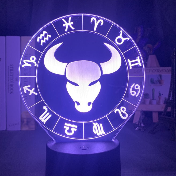 Taurus bull engraved on the acrylic zodiac night light, lit purple