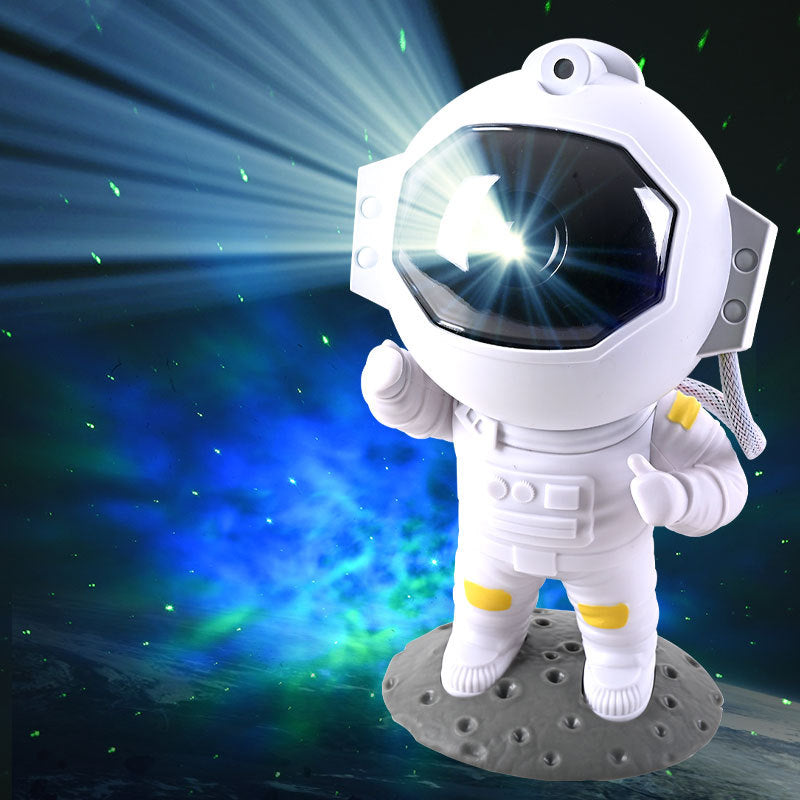 The astronaut projector lit, casting a blue and green nebula with green stars