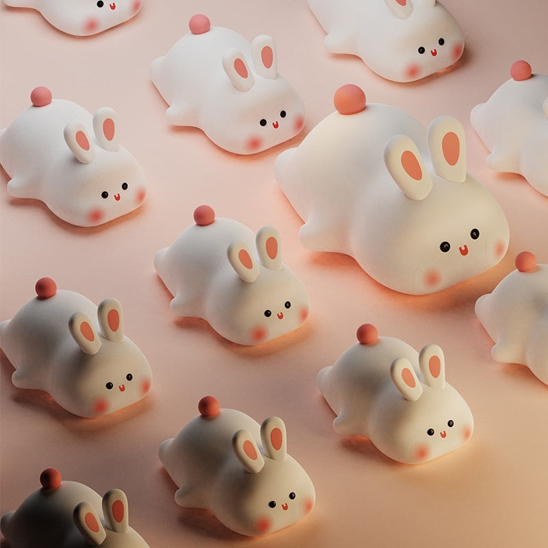 A group of the silicone rabbit lights unlit, showing the soft white body and pink ears